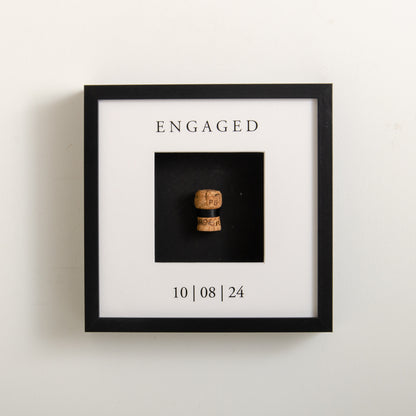 First toast engaged cork saver frame