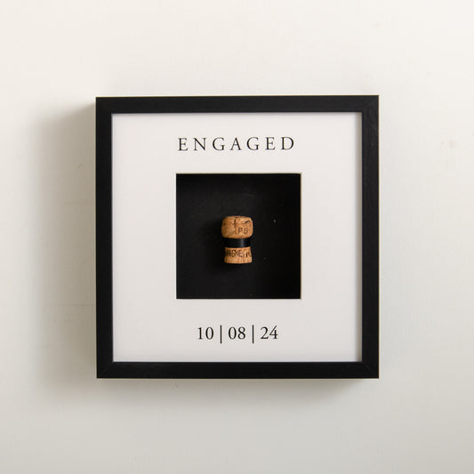 First toast engaged cork saver frame