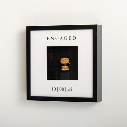 First toast engaged cork saver frame