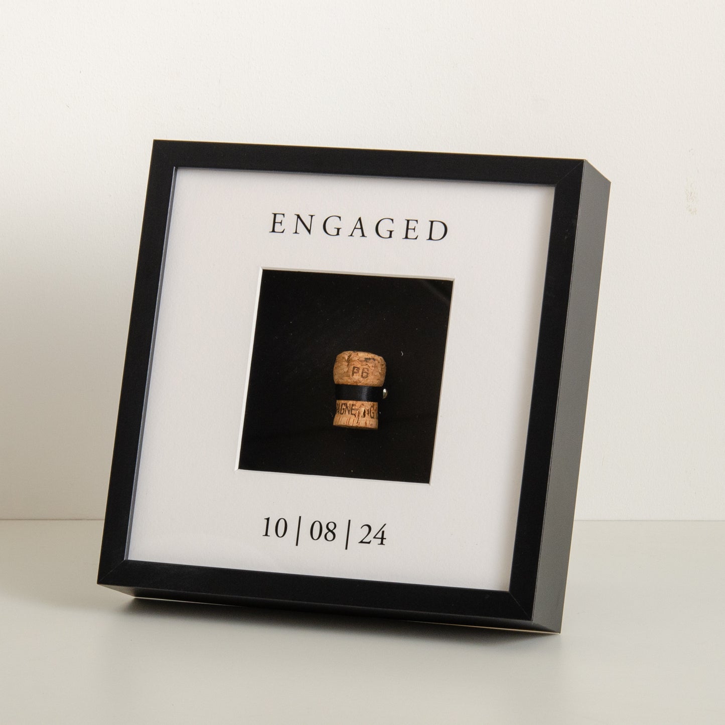 First toast engaged cork saver frame