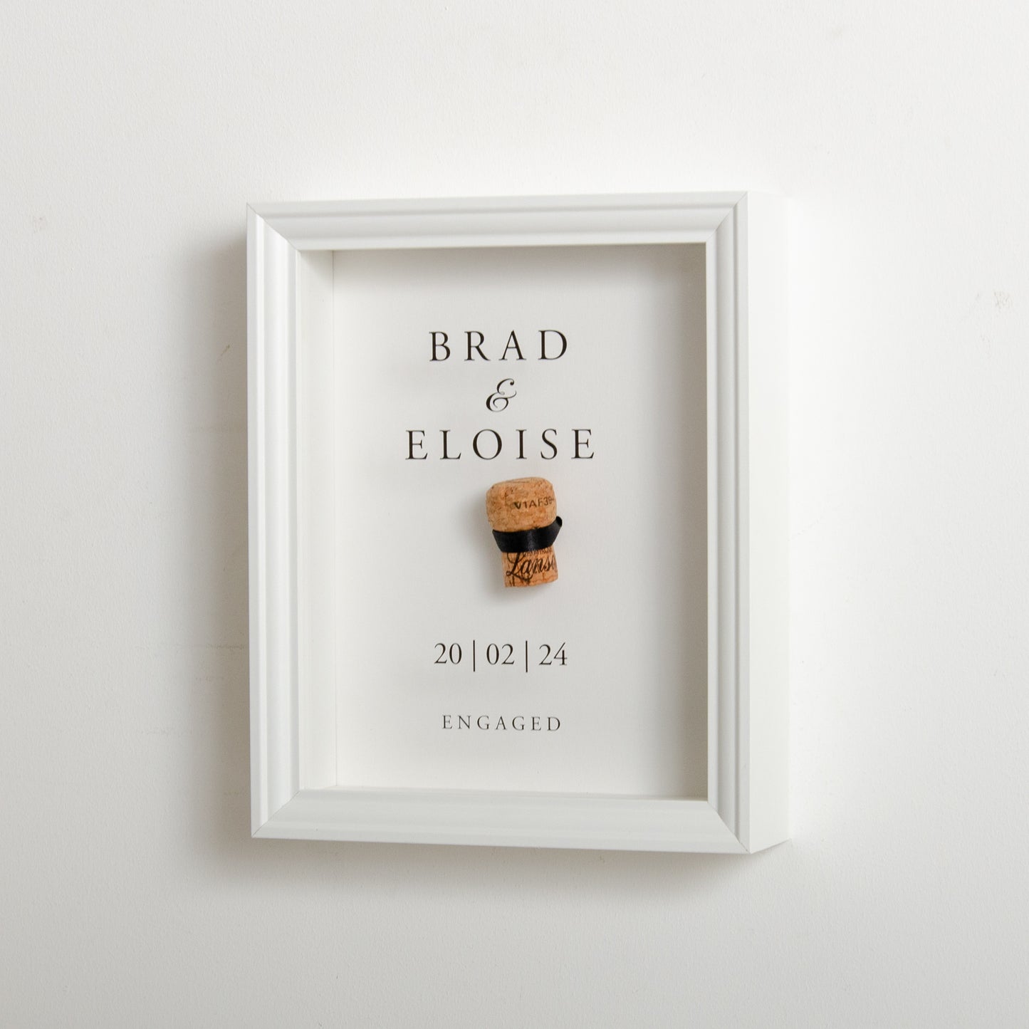 First toast engagement cork saver frame