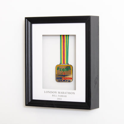 Personalised medal frame