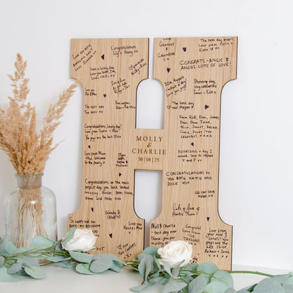 Letter guest book sign