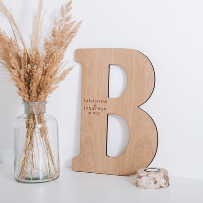 Letter guest book sign