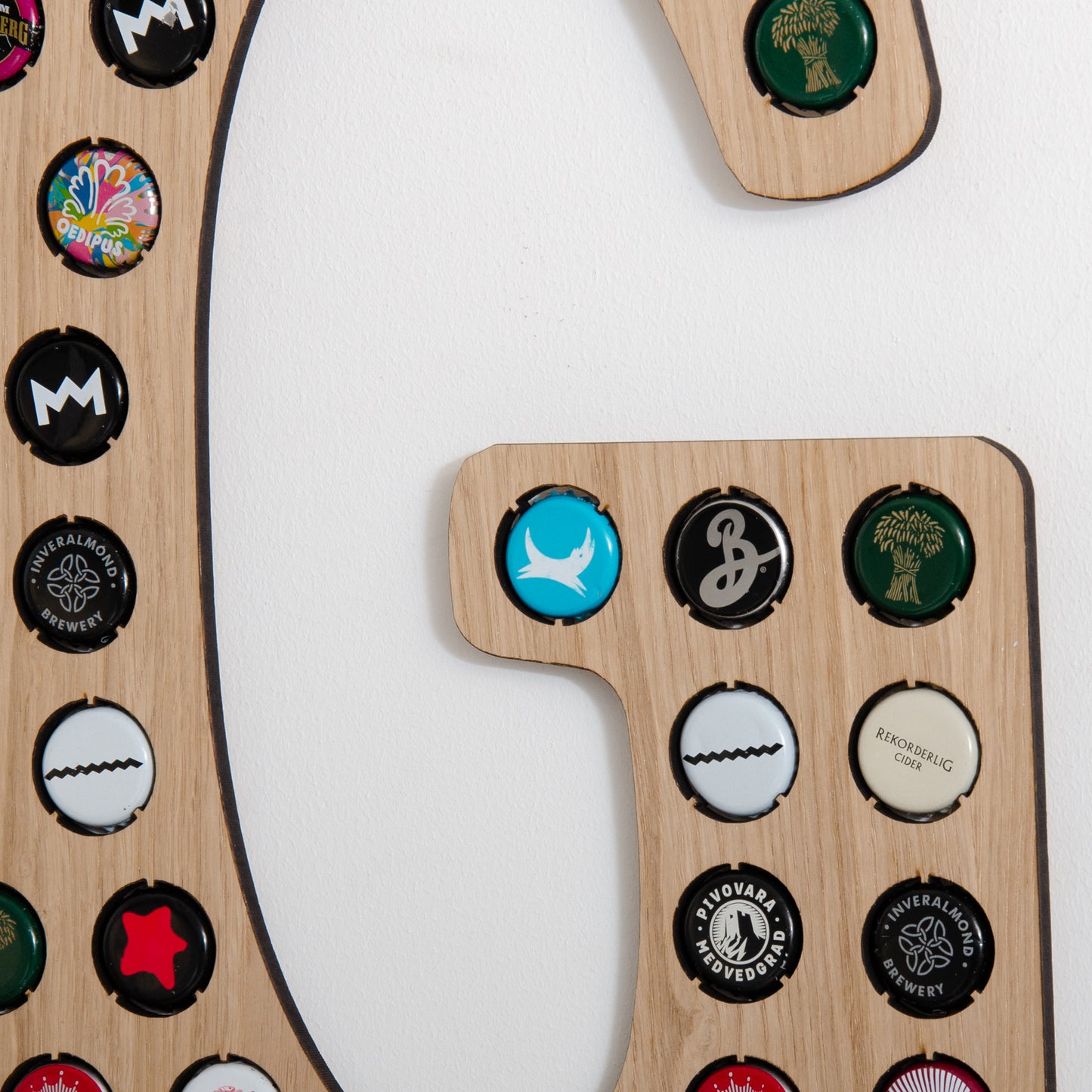 Initial beer cap wall hanging