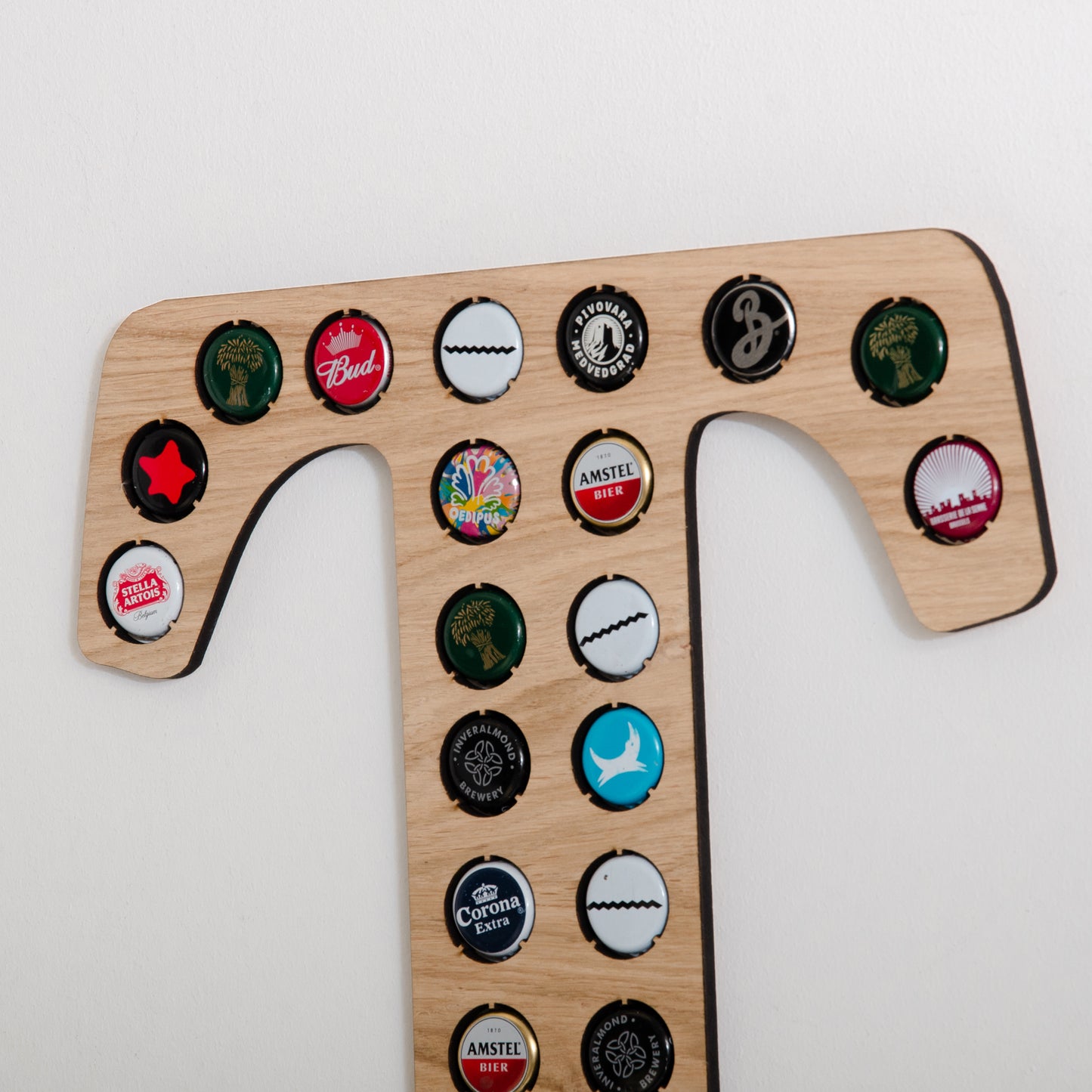 Initial beer cap wall hanging