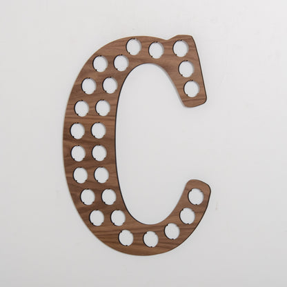 Initial beer cap wall hanging