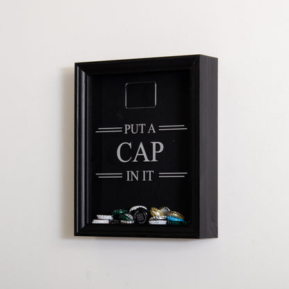 'Put a cap in it' frame