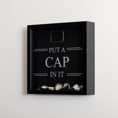 'Put a cap in it' frame