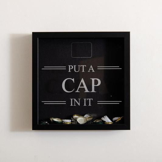 'Put a cap in it' frame