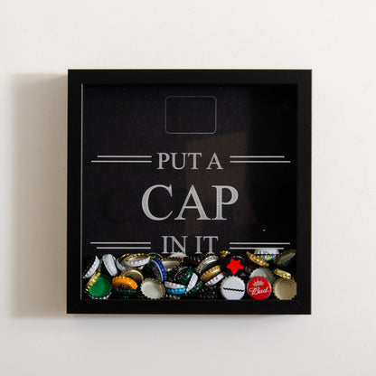 'Put a cap in it' frame